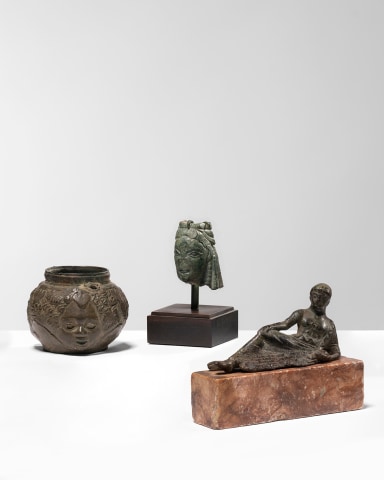 8. Roman vessel with three heads, c.1st-2nd century AD