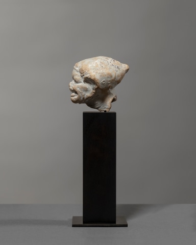 Greek grotesque head of a grimacing woman, c.3rd century BC