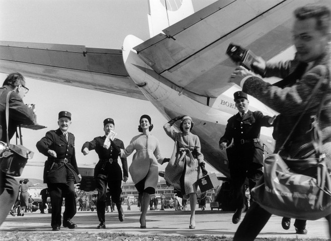 William Klein, Group Running in Front of a Pan American Boeing 707, Paris (Vogue), 1958