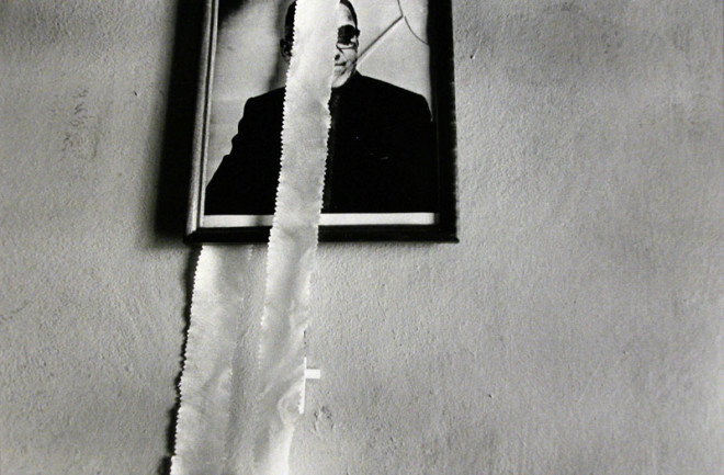 Larry Towell, Oscar Romero, El Salvador [photo on wall], 1986