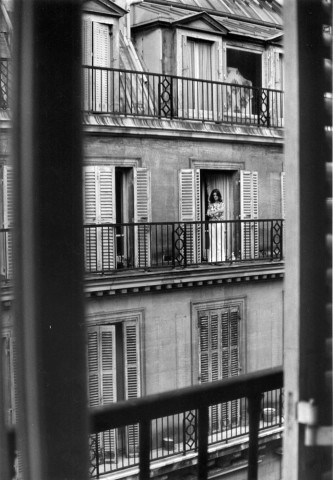 André Kertész, Paris [Woman on balcony], July 12, 1975