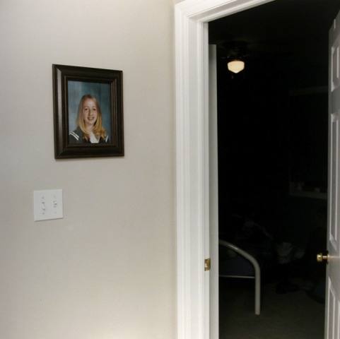 Jaret Belliveau, Untitled [school photo of girl on wall], 2006