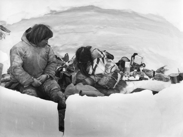 Richard Harrington, Untitled [lady sewing in open igloo], circa 1950