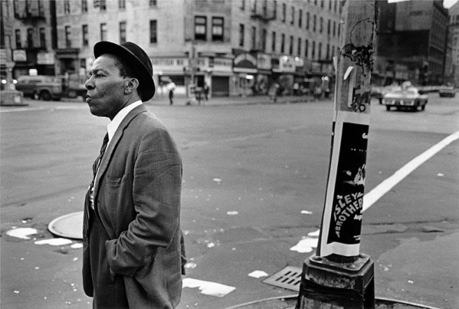 Dawoud Bey, A Man on the Corner of Lenox Avenue and 125th Street, 1976