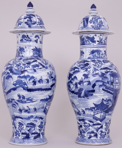 A PAIR OF HIGHLY UNUSUAL, TALL AND FINE CHINESE BLUE AND WHITE VASES AND COVERS, Kangxi (1662-1722)