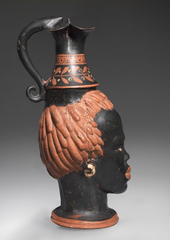 Greek black-glaze head vase  Apulia, 4th century BC  Terracotta  Height 24.5 cm