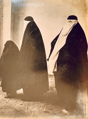 Antoin Sevruguin, Two women and a girl wearing black chadors and white ruband face-veils, Late 19th Century or early 20th Century
