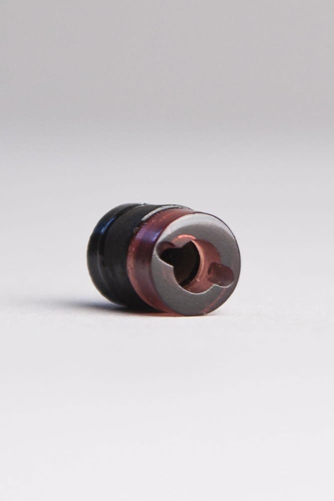 Susan Collis I dreamed I had it all, 2007 Hand-cut garnet and onyx 8 x 8 x 15 mm Edition of 20