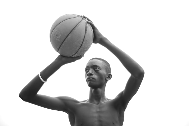 Mário Macilau, Untitled, (Boy with a basketball) Out of Town Series , 2015-22