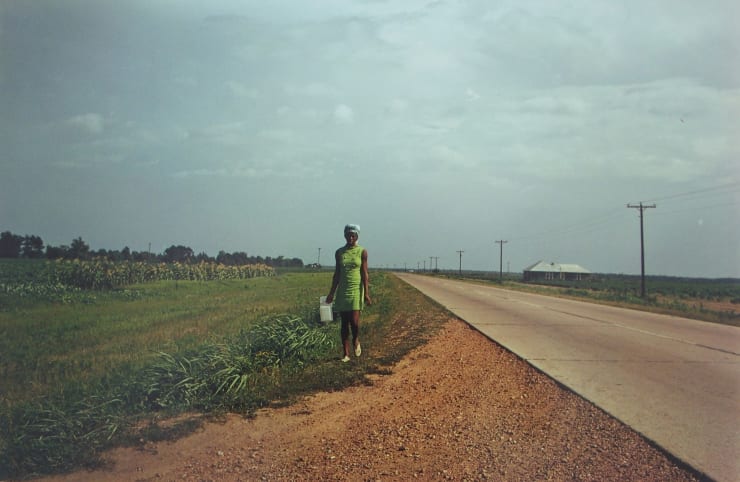 William Eggleston, Untitled (Girl in Green Dress Walking) Near Minter City & Glendora, Mississippi, from the William Eggleston's Guide Series., 1973