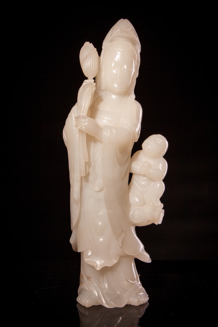 A White Jade Carving of Guanyin
