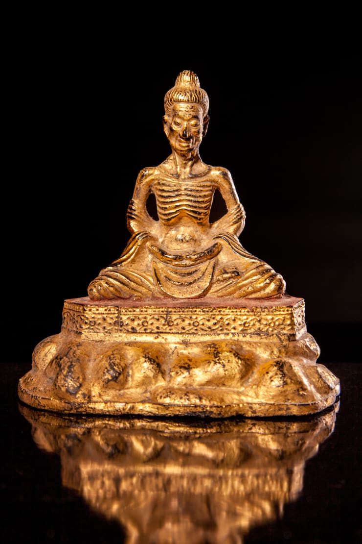 Two Gilded and Lacquered Bronze Fasting Buddha