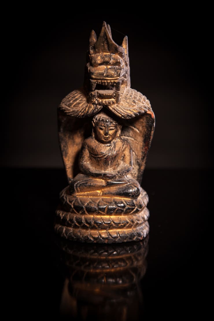 Lacquered and Gilded Wood Buddha Seated in A Naga Shrine