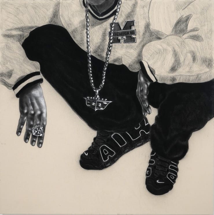 charcoal drawing of a man crouching wearing air jordans and a cadillac symbol necklace