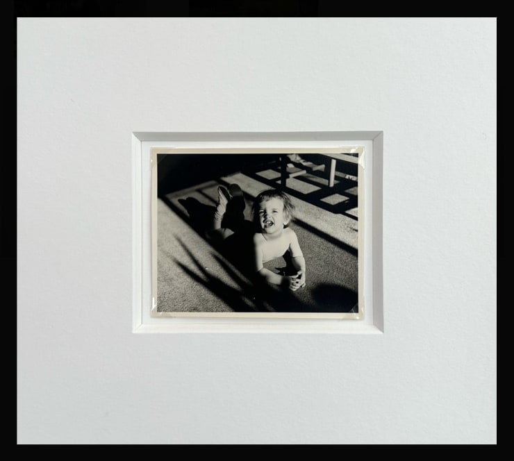 Untitled (Child playing on the floor)