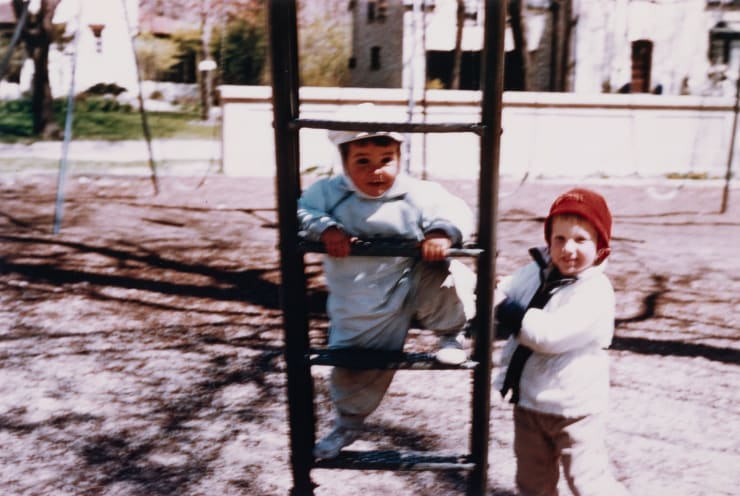 Untitled (Two kids playing at the park)