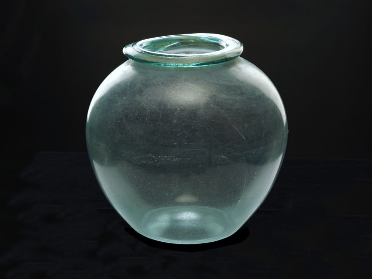 Roman, A Roman pale blue glass cinerary urn, Western Empire, late 1st - 2nd century AD