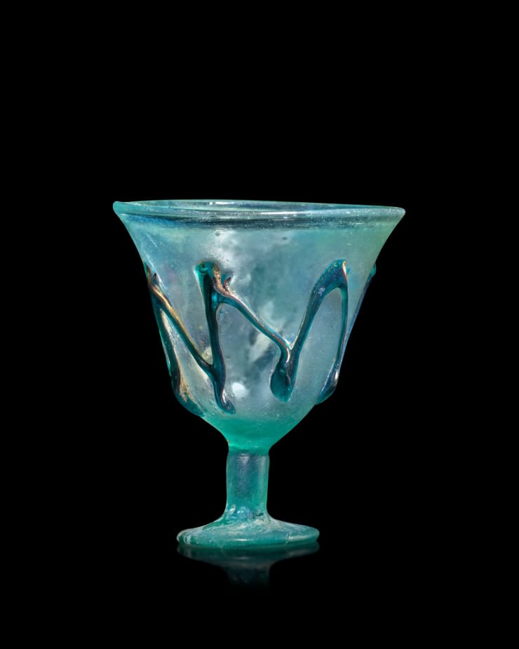 Byzantine, A Byzantine pale blue-green glass stemmed goblet, Circa 5th - 6th century AD