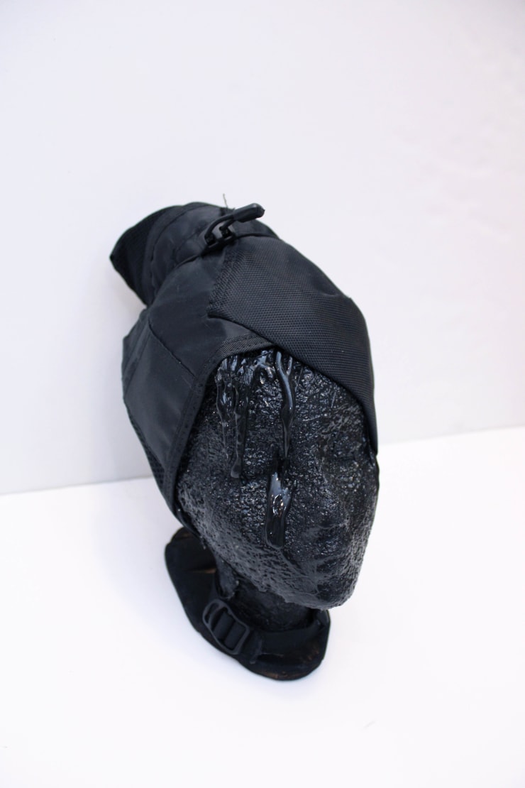 Calli Roche Ballistic head wrap, 2022 21 layers of Kevlar, silk and nylon 20 × 20 × 30 cm 8 x 8 x 12 inch
