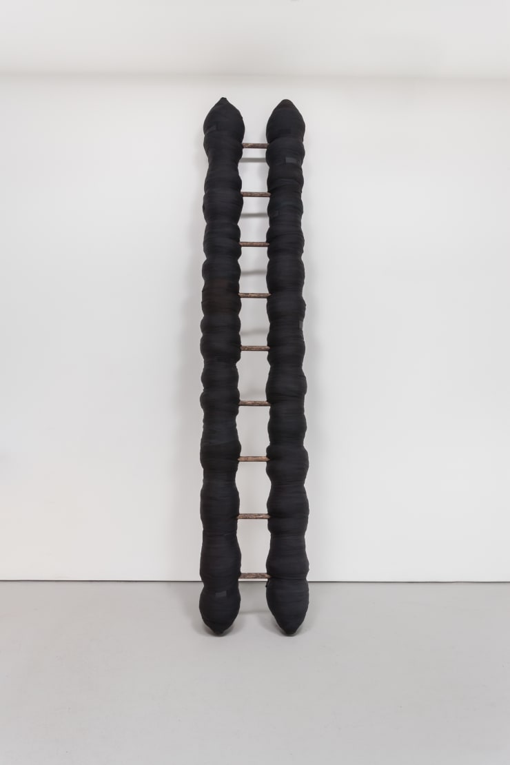 Cheryl Pope STANDING STRONG (TITLE OF A POEM BY ED ROBERSON, 2013), 2016 wood ladder, 481 boxing handwraps 120 x 10 x 30 in. 304.8 x 25.4 x 76.2 cm
