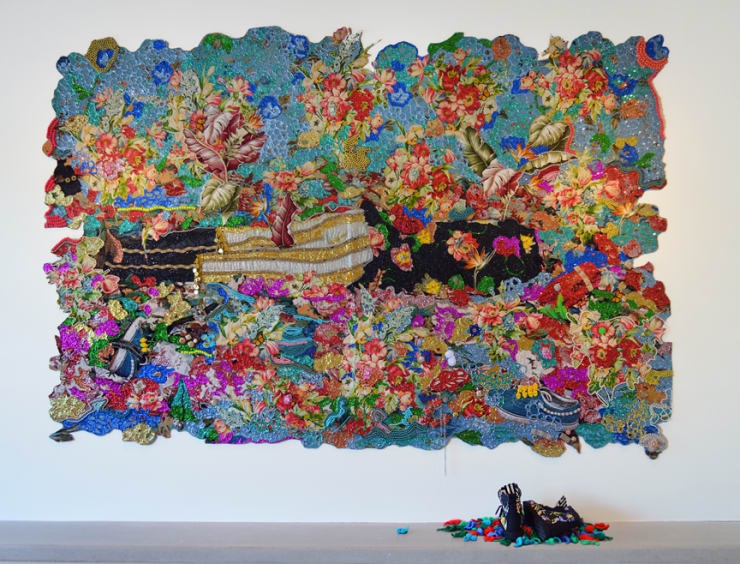 Ebony G. Patterson In Rest-Dead Treez, 2015 Mixed media jacquard woven tapestry with handmade shoes and 150 crocheted leaves 84 x 113 1/2 in. 213.36 x 288.29 cm