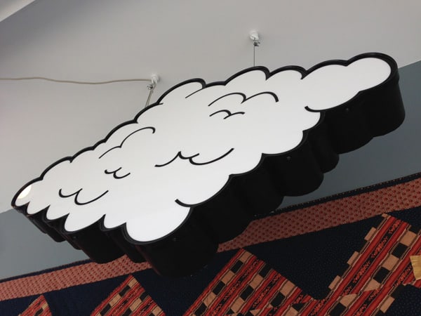 Sanford Biggers Cumulous (small), 2013 Aluminum, plexiglass, vinyl, LEDs, variable flasher 25 x 44 x 5 1/4 in. 63.5 x 111.76 x 13.34 cm Edition of 3