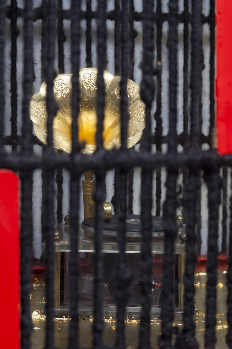 Cheryl Pope CAUGHT A CHILL: #396, 2016 bird cage, yarn, plastic, music box, autobody paint, speaker, arduino, zipper pulls, faux chain necklace, solfeggio frequency, gold leaf 14 x 9 x 48 in. 35.6 x 22.9 x 121.9 cm