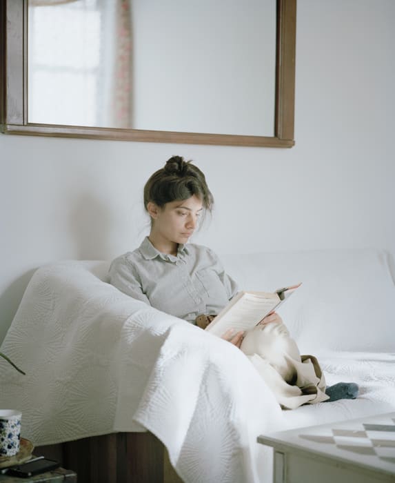 Carrie Schneider Megha reading Edith Wharton (The House of Mirth, 1905) from the series Reading Women (2012-2014), 2014 C-print 36 x 30 in. 91.44 x 76.2 cm Edition of 5 plus 2 artist's proofs