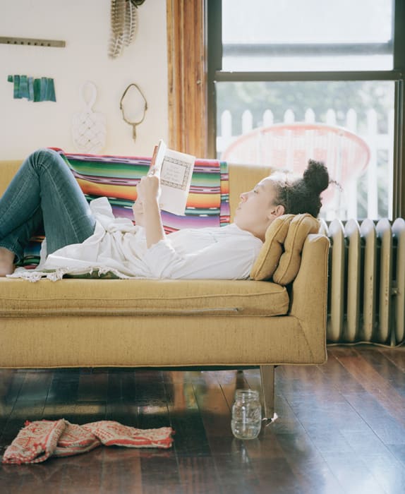 Carrie Schneider, Sarah reading Zora Neale Hurston (Every Tongue Got to Confess: Negro Folk-Tales from the Gulf States, collected late 1920s, pub. 2001) from the series Reading Women (books), 2016