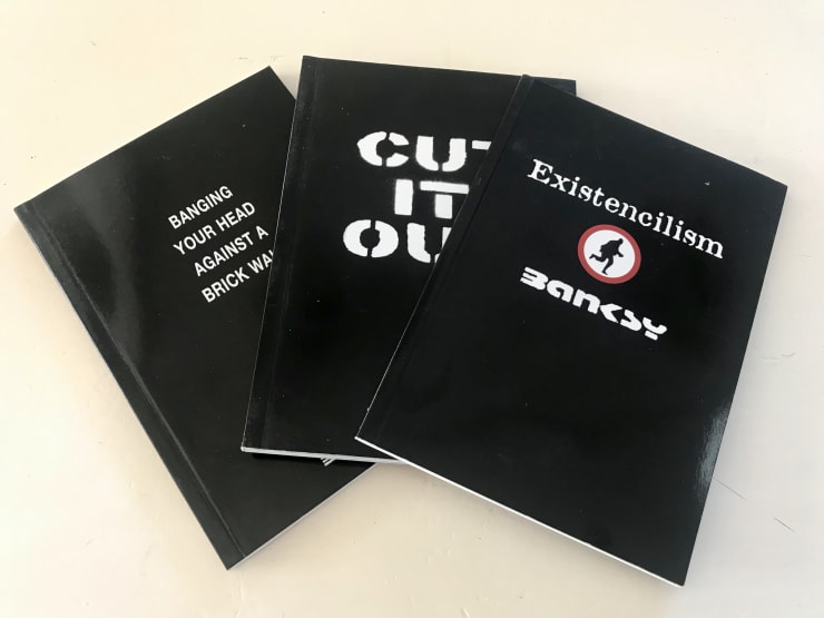 Banksy, "Cut It Out" - Existencilism - Banging Your head..., 2001