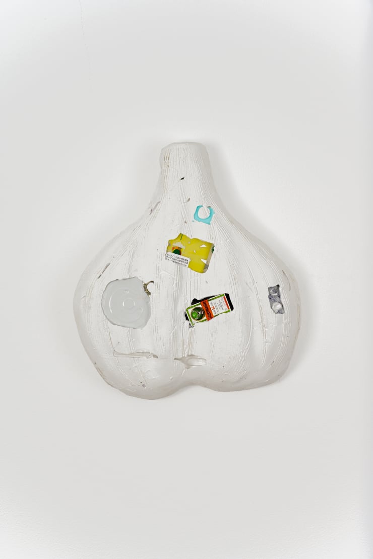 Yusuke Saito What is this? (Garlic) , 2021 Cement, found objects. 12 1/8 x 10 5/8 x 2 1/2 in 30.5 x 27 x 6.5 cm