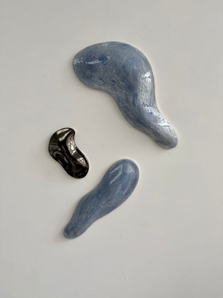 Glazed blue and black ceramic sculpture by Fringe Gallery artist Angela Okajima-Kempinas