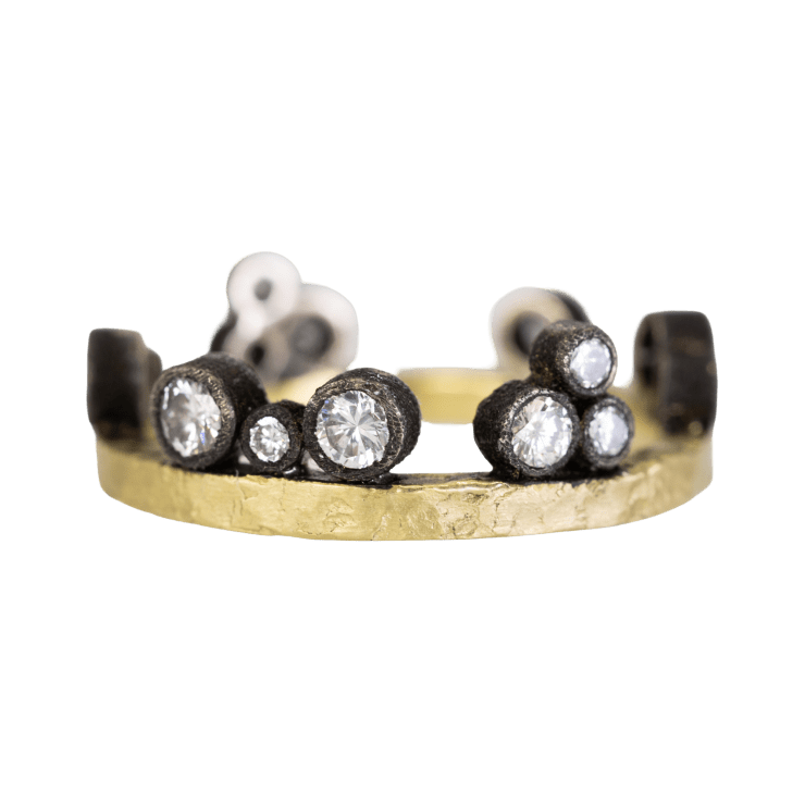 2mm 18k yellow gold band set on the side with 14 diamonds in 14k white gold bezels by Fringe Gallery studio jeweler Todd Pownell