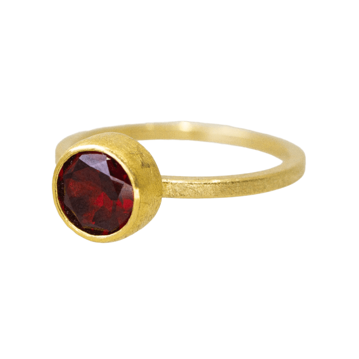22k and 18k yellow gold ring with faceted garnet by Fringe Gallery studio jeweler Petra Class