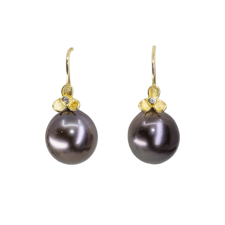 Tahitian pearl earrings with 18k gold trillium flower and diamond tops by Fringe Gallery studio jeweler Barbara Heinrich