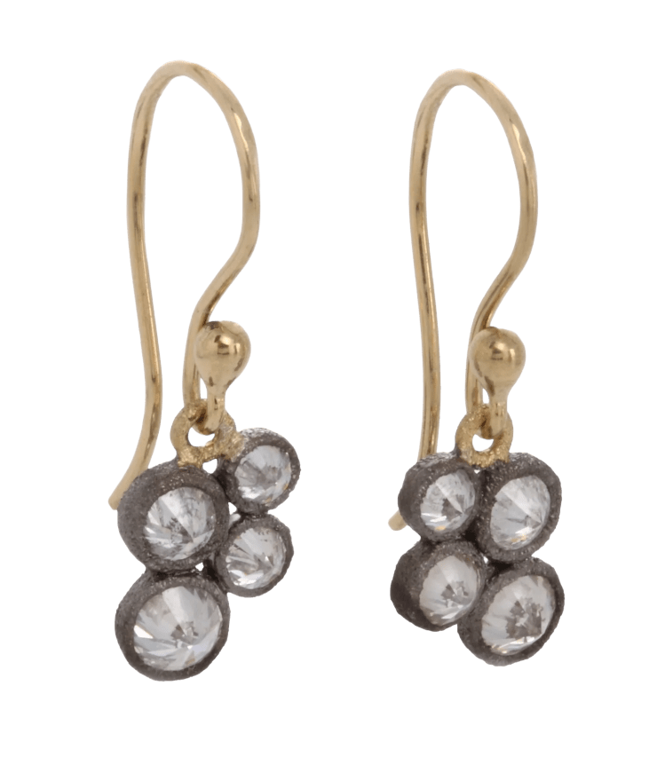 Inverted diamond drop earrings with darkened gold bezels by Fringe Gallery studio jeweler Todd Pownell