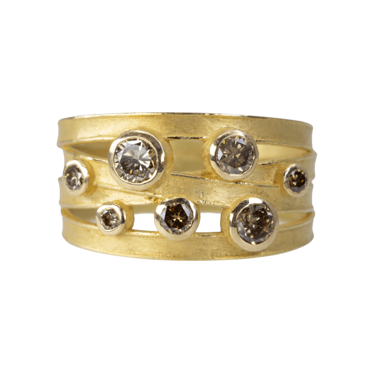 18k yellow gold four flat ribbon ring with 7 various sized and colored brown diamonds by Fringe Gallery studio jeweler Barbara Heinrich
