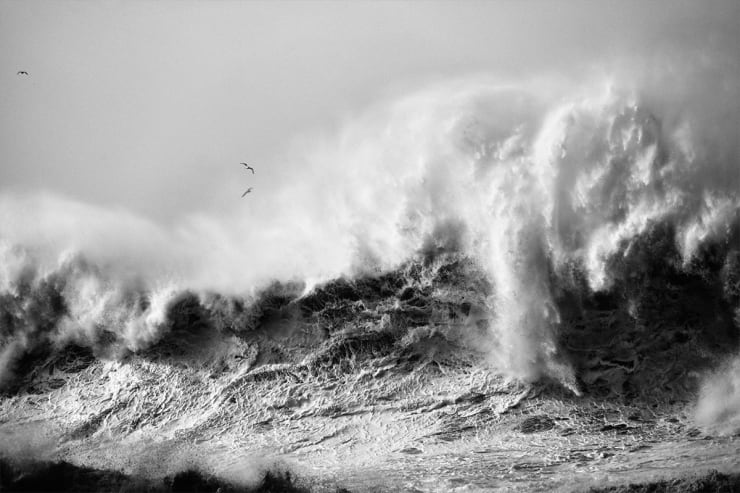 Alessandro Puccinelli photo of black and white waves crashing with sea foam and mist