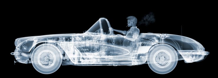 Nick Veasey x-ray photography of corvette cruiser with man smoking cigarette