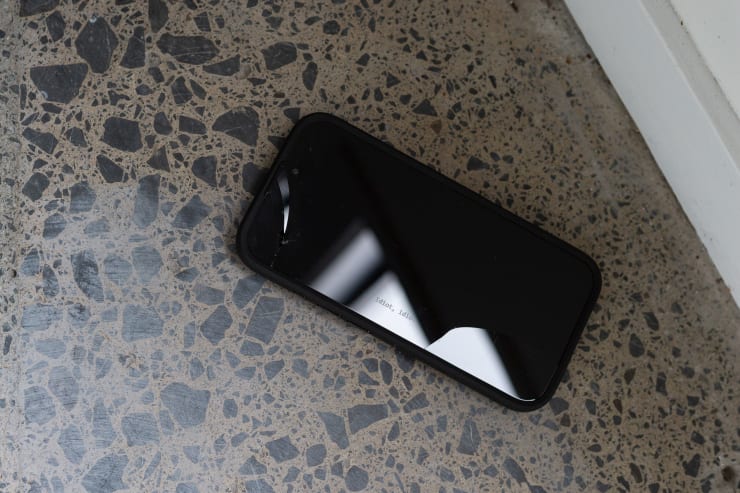 Matthew Galloway Watch History (idiot, idiot), 2025 Engraved replica iPhone 16 handset (broken), Quad Lock case and magnetic mount 1 x 7.5 x 15 cm 1/2 x 3 x 6 in