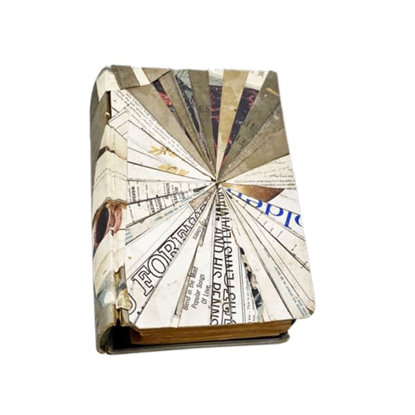 Untitled yellow/white book, 2021 Collage on book 9 3/4 x 7 1/2 x 1 1/2 inches