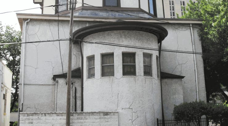 Cracks on the facade of Holy Trinity Cathedral, located a block south from the gallery.
