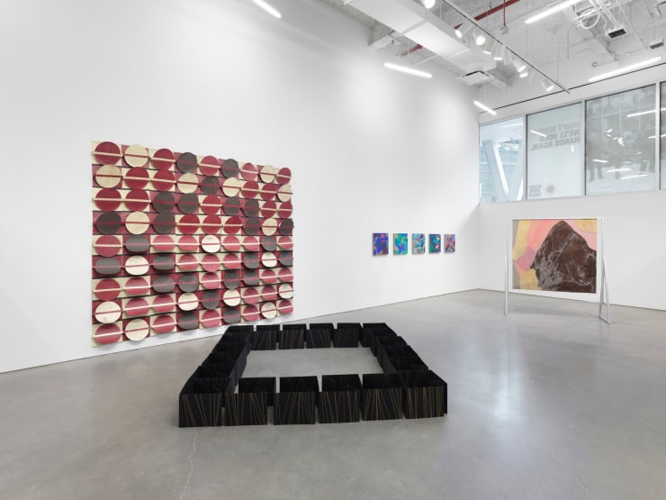 At left, on the wall and ground, is Mary Valverde’s two-piece installation, Huaca (2021).Credit...Mary Valverde and BRIC House; Sebastian Bach