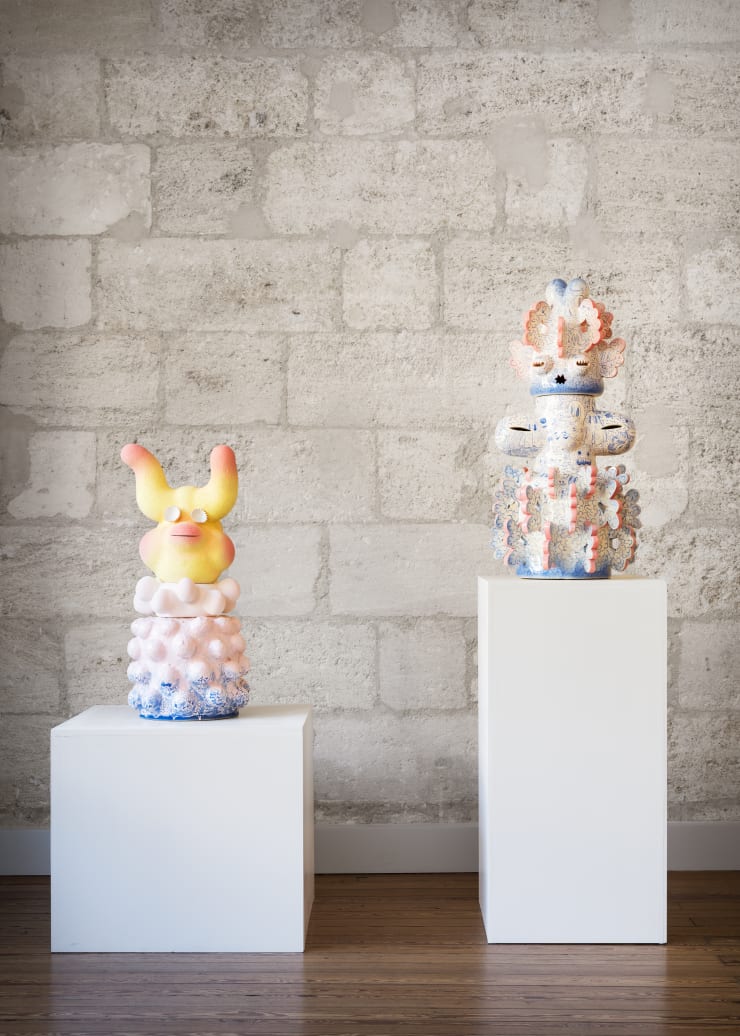 Installation view of two ceramic sculptures by American artist Kartini Thomas: Tattooed Space Monkey (2025) and Top Moumoute (2024), on display at Galerie REVEL.