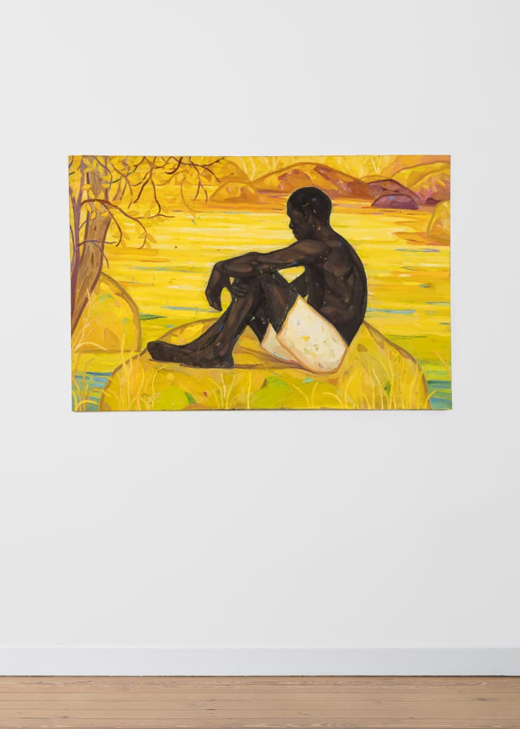 Installation view of See You in Light #2 by Stephen Price, featuring a seated male figure in yellow landscape with glowing water reflections