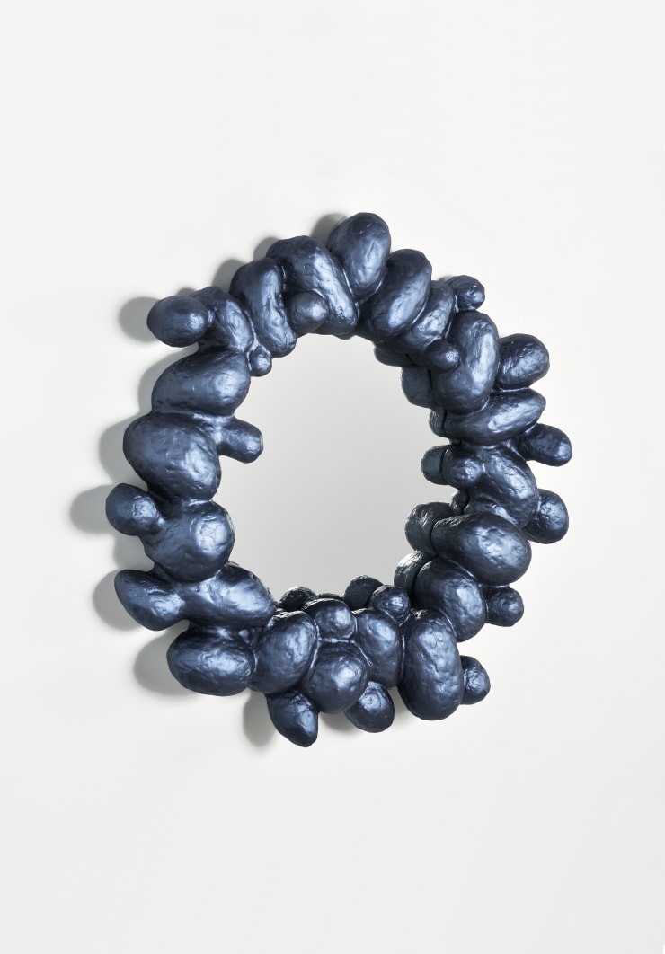 Collectible blue mirror by Humberto da Mata.