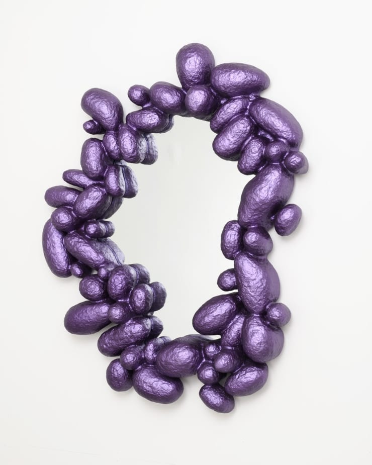 Purple collectible mirror designed by Humberto da Mata