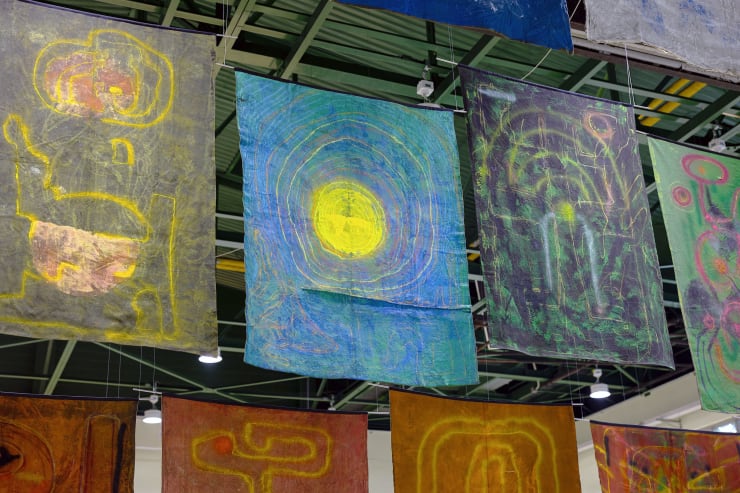 MINOUK LIM. INSTALLATION VIEW. CAMP GREAVES, PAJU, KOREA. CURRAHEE – STAND ALONE, 2023. 36 MILITARY BLANKETS, ACRYLIC PAINT, SPRAY PAINT, DIMENSIONS VARIABLE.