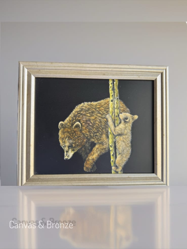 A framed painting depicting a bear and cub climbing a tree, with detailed fur textures and a dark background, emphasizing natural wildlife themes.