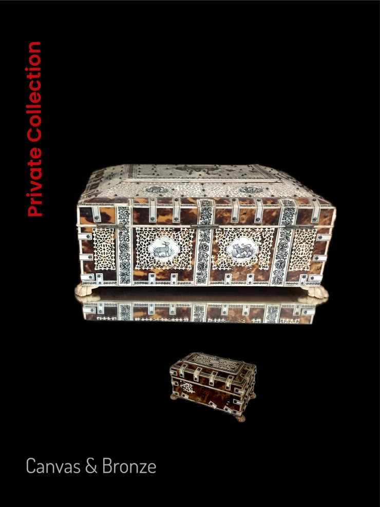 Ornate decorative box with intricate geometric patterns and rich cultural motifs on a reflective surface.